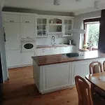 Mragowo Pokoje Apartament ゲストハウス ムロンゴヴォ